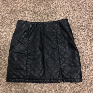 Black leather skirt with cut out